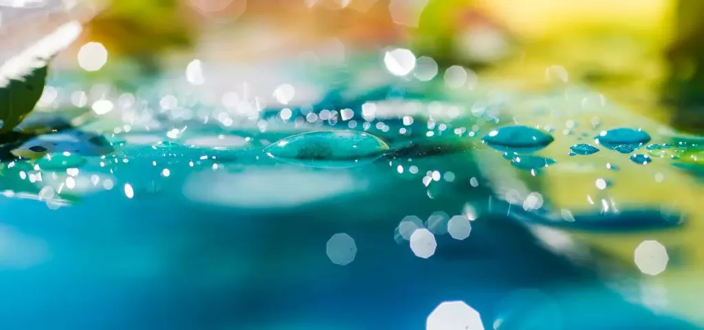 Image of light and wind blowing on the surface of water
