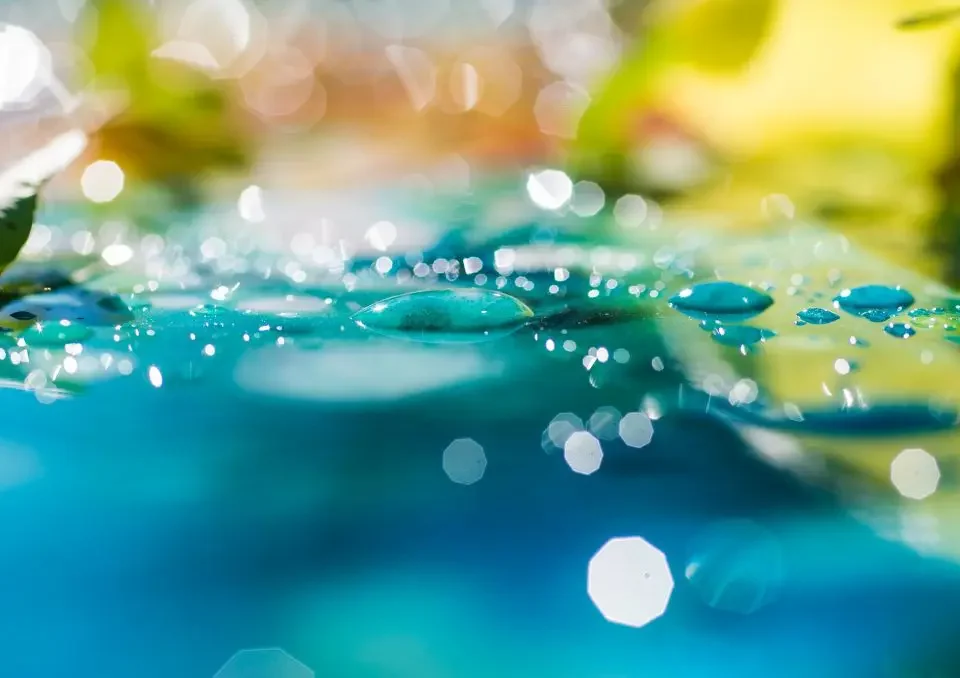 Image of light and wind blowing on the surface of water