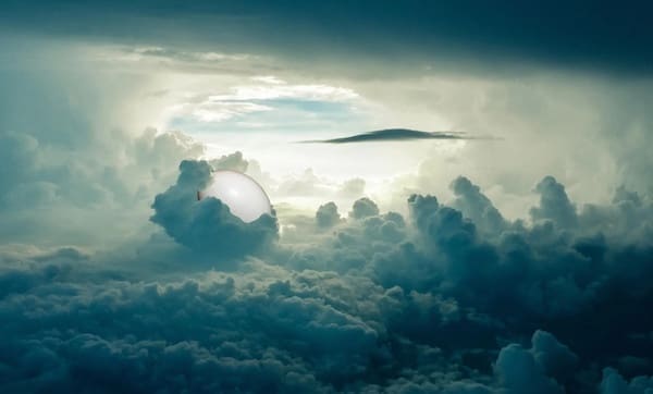 Image of the sky with what looks like an egg in the clouds