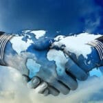 Image of two people shaking hands