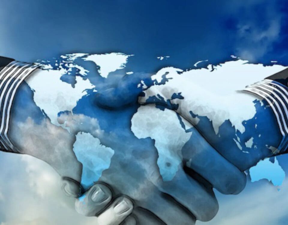 Image of two people shaking hands